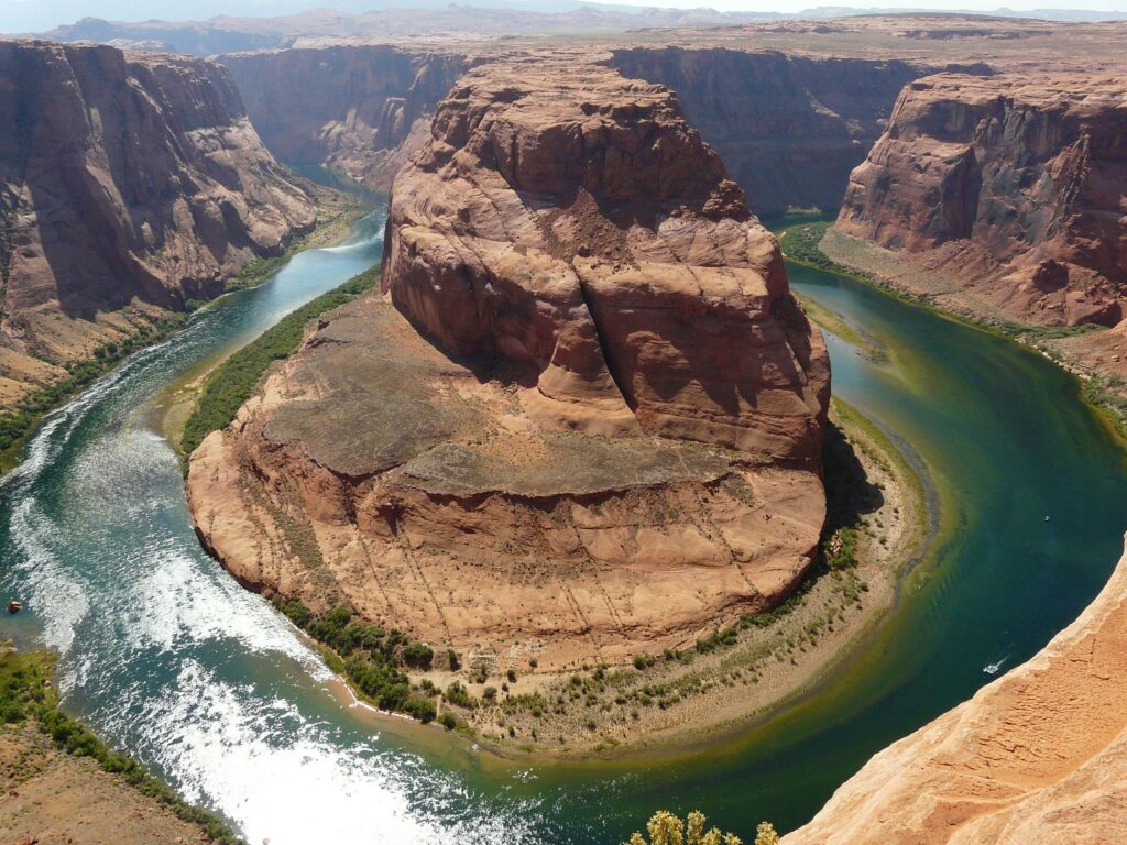 Stunning aerial view of Horseshoe Bend, Arizona with the Colorado River carving through the canyon.